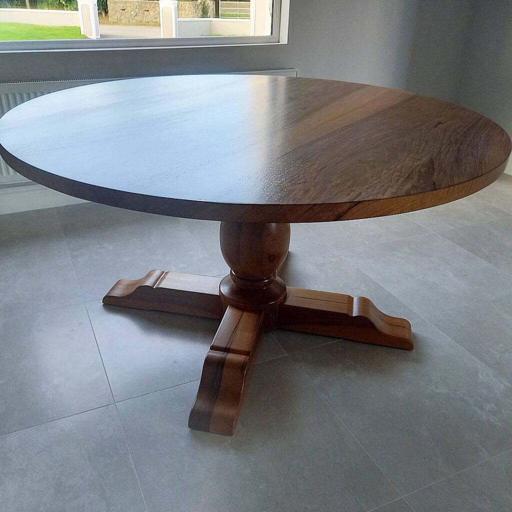 Pedestal style dining table